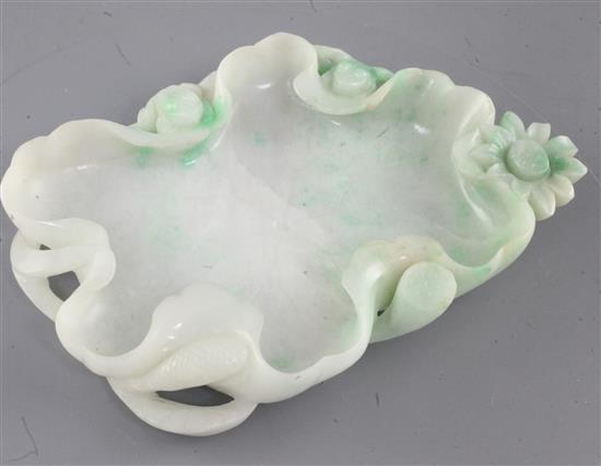 A Chinese jadeite lotus leaf brushwasher, length 15.5cm, tiny chips to a few edges